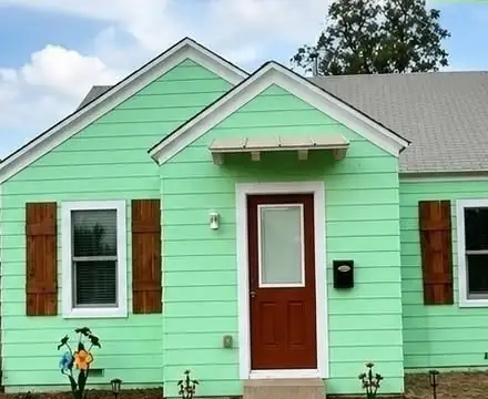 Fully remodeled small home painted mint green